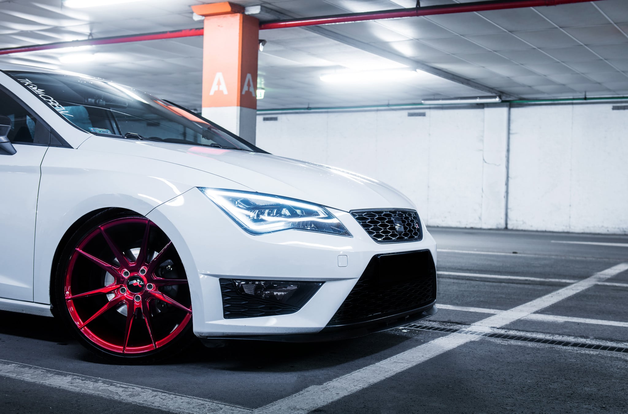 White Seat Leon with Custom Headlights - Photo by JR Wheels
