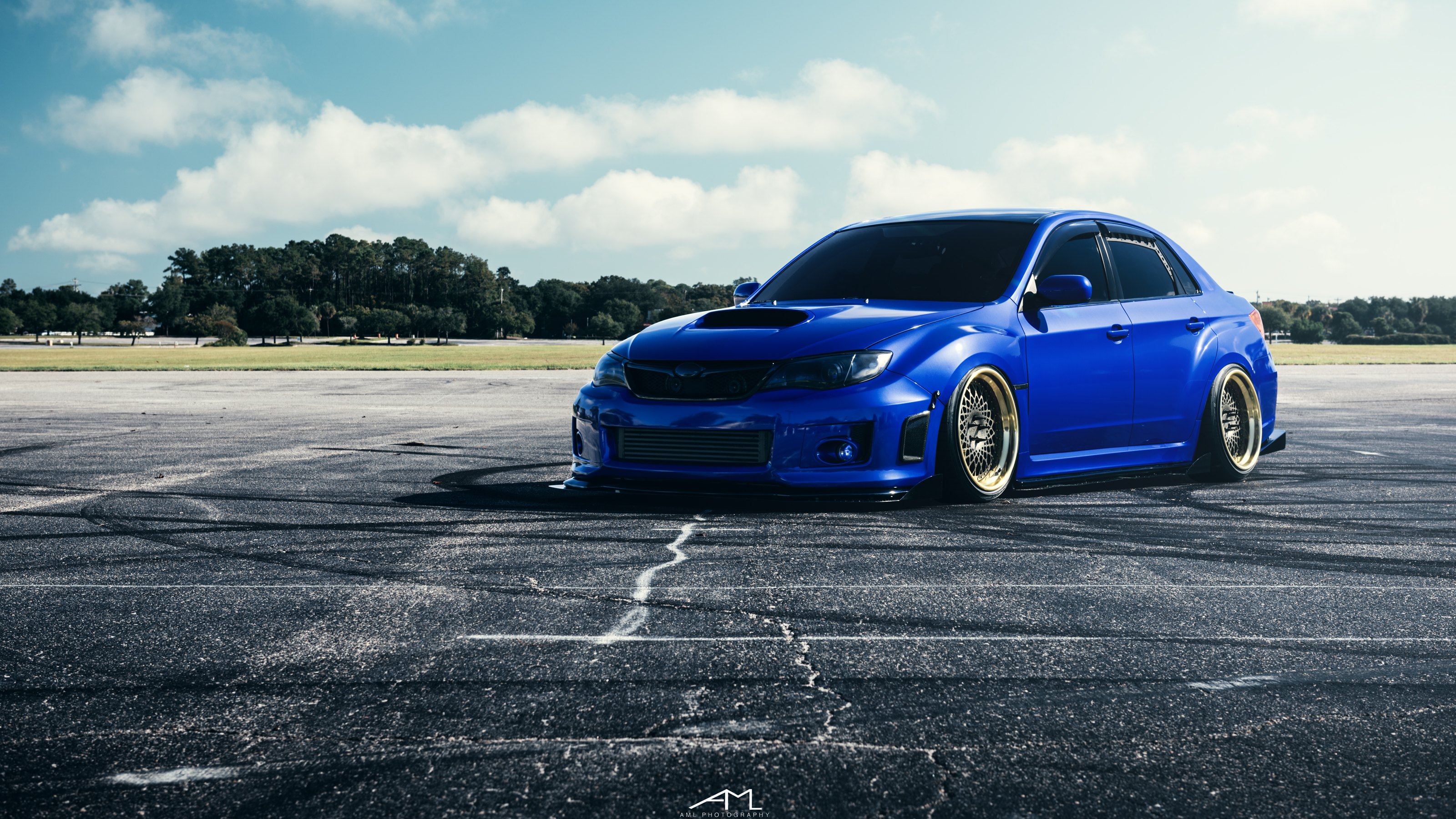 Custom Blue Stanced Subaru WRX - Photo by Arlen Liverman.