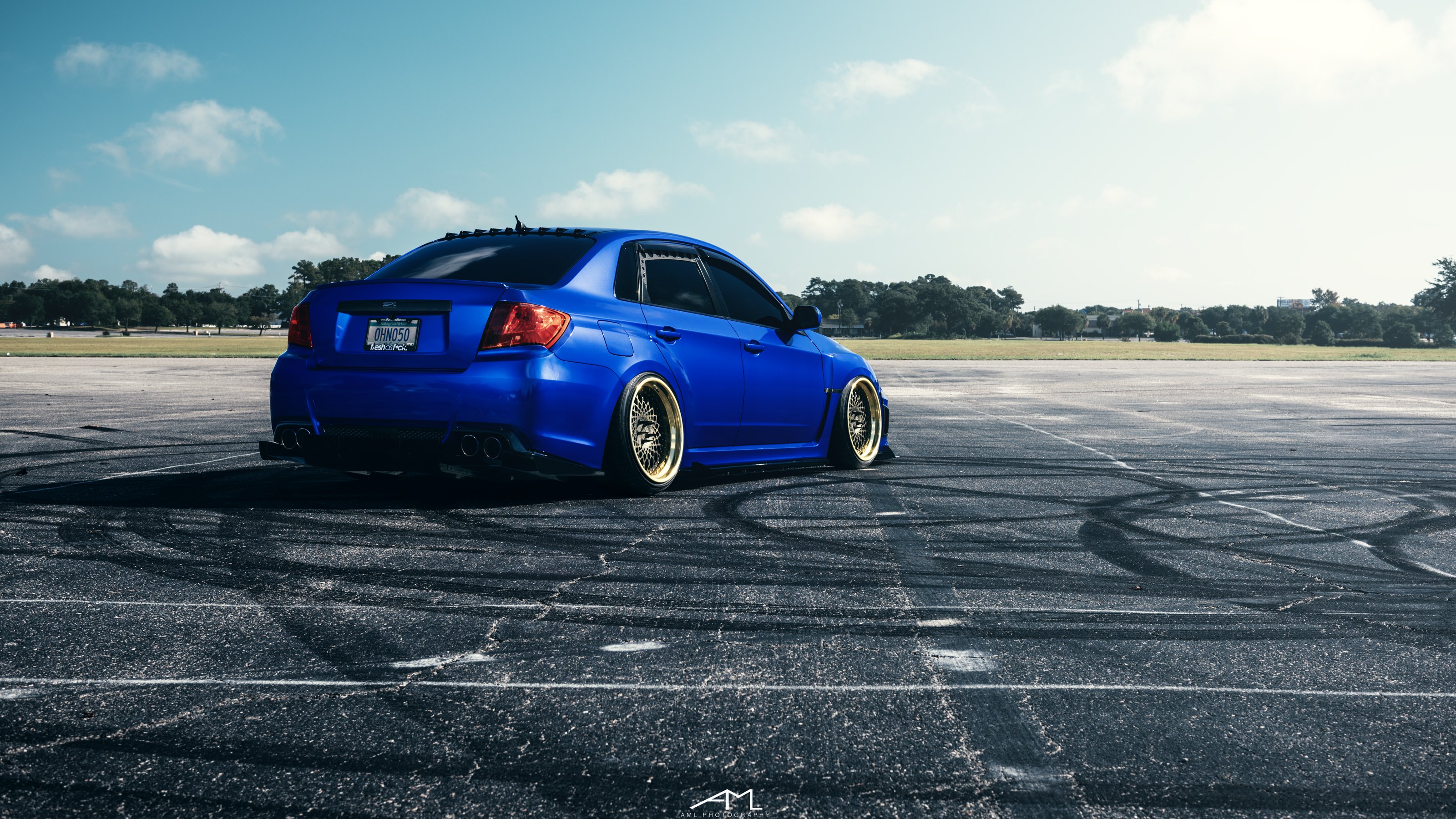 Blue Stanced Subaru WRX with Aftermarket Rear Diffuser - Photo by Arlen Liv...