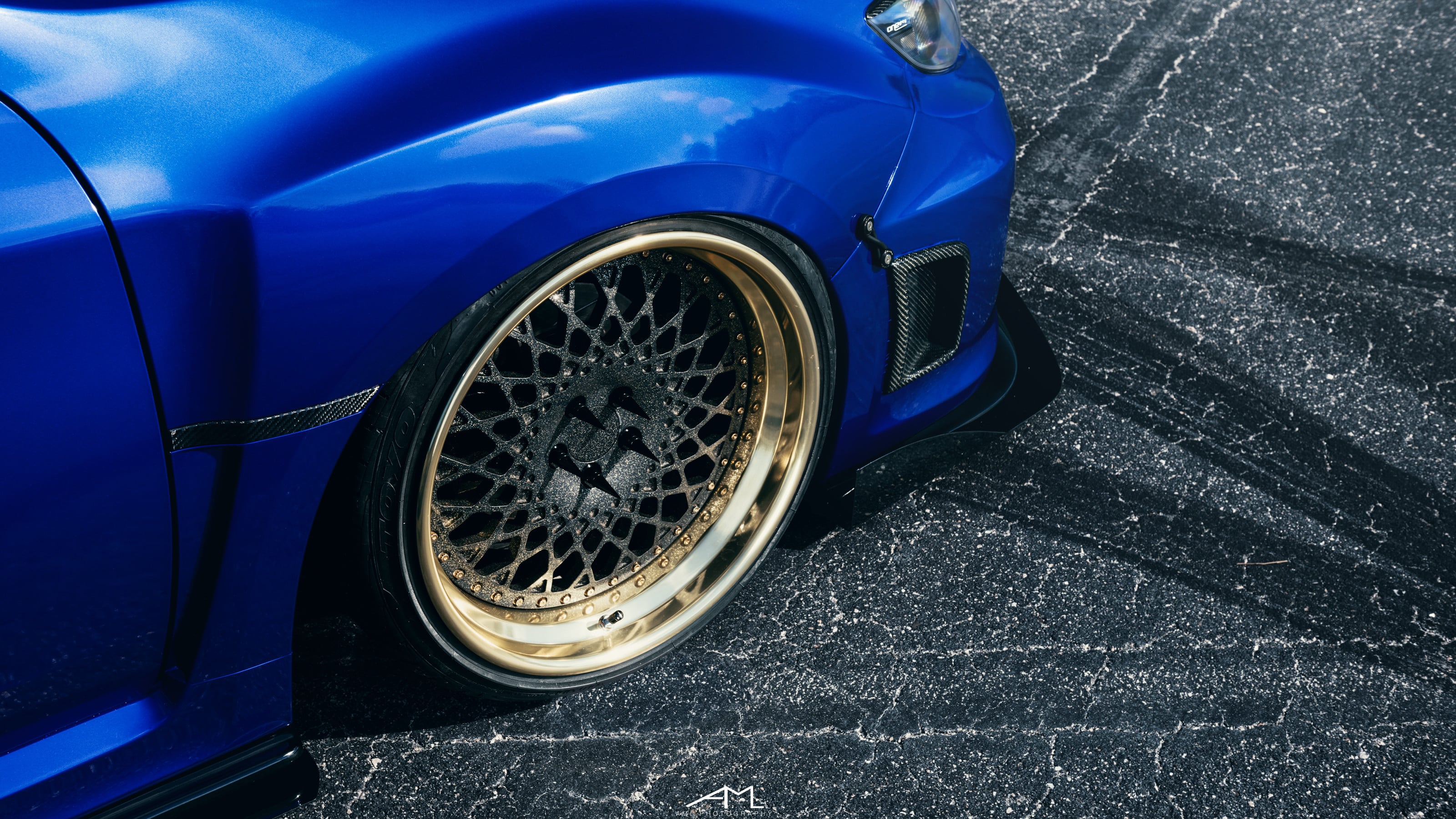 Carbon Fiber Side Vents on Blue Subaru WRX - Photo by Arlen Liverman
