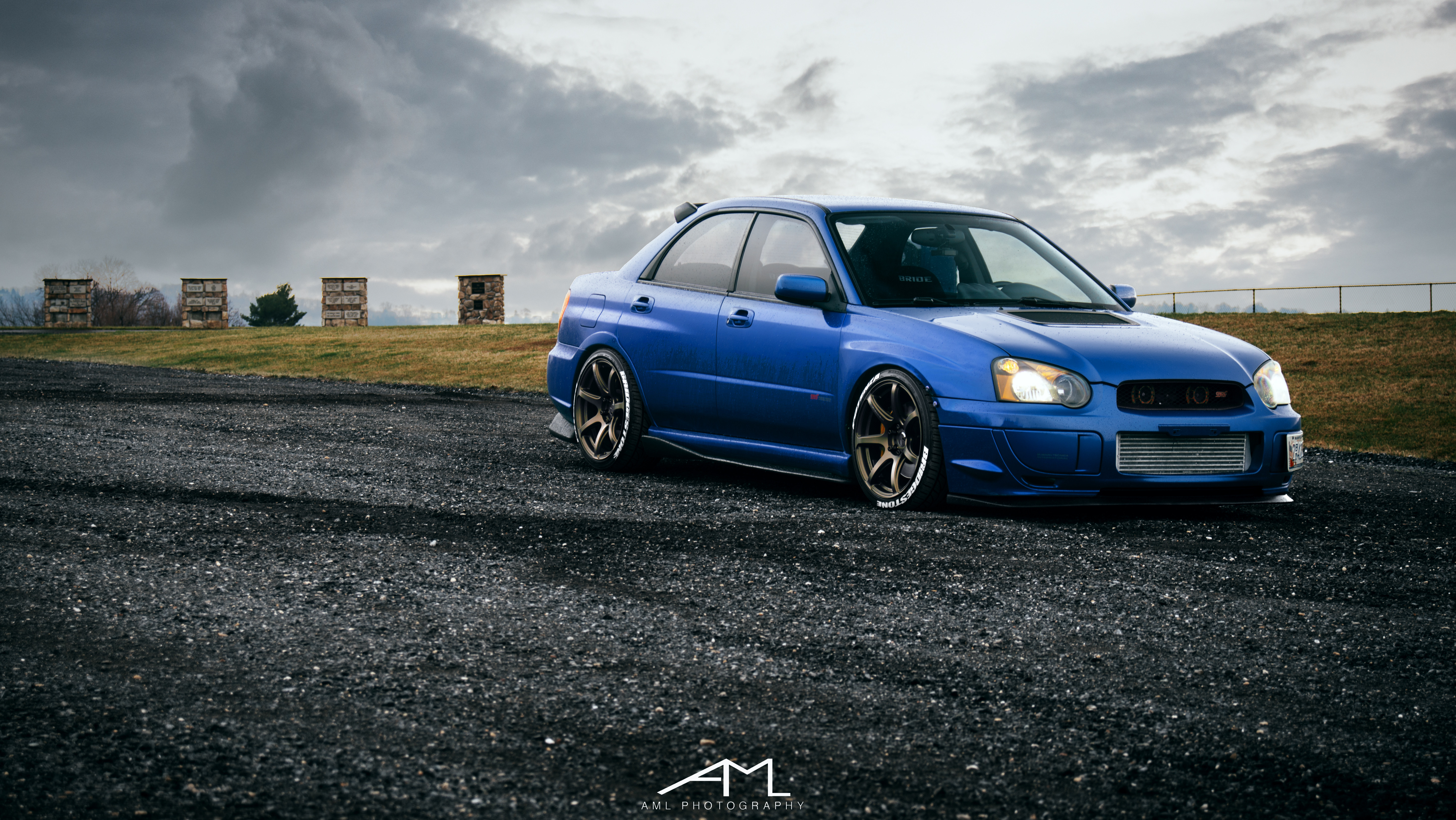 Carbon Fiber Side Skirts on Blue Subaru WRX STI - Photo by Arlen Liverman