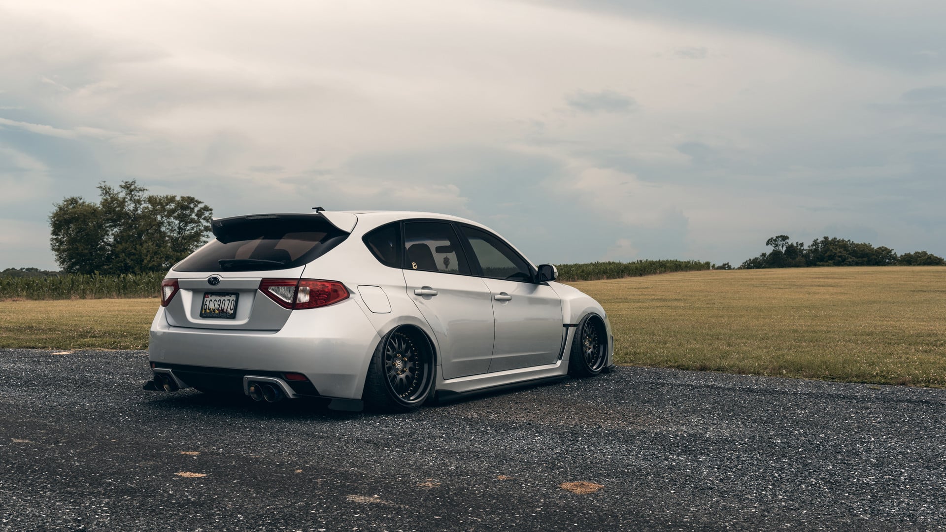 Silver Subaru WRX with Large Roofline Spoiler - Photo by Arlen Liverman