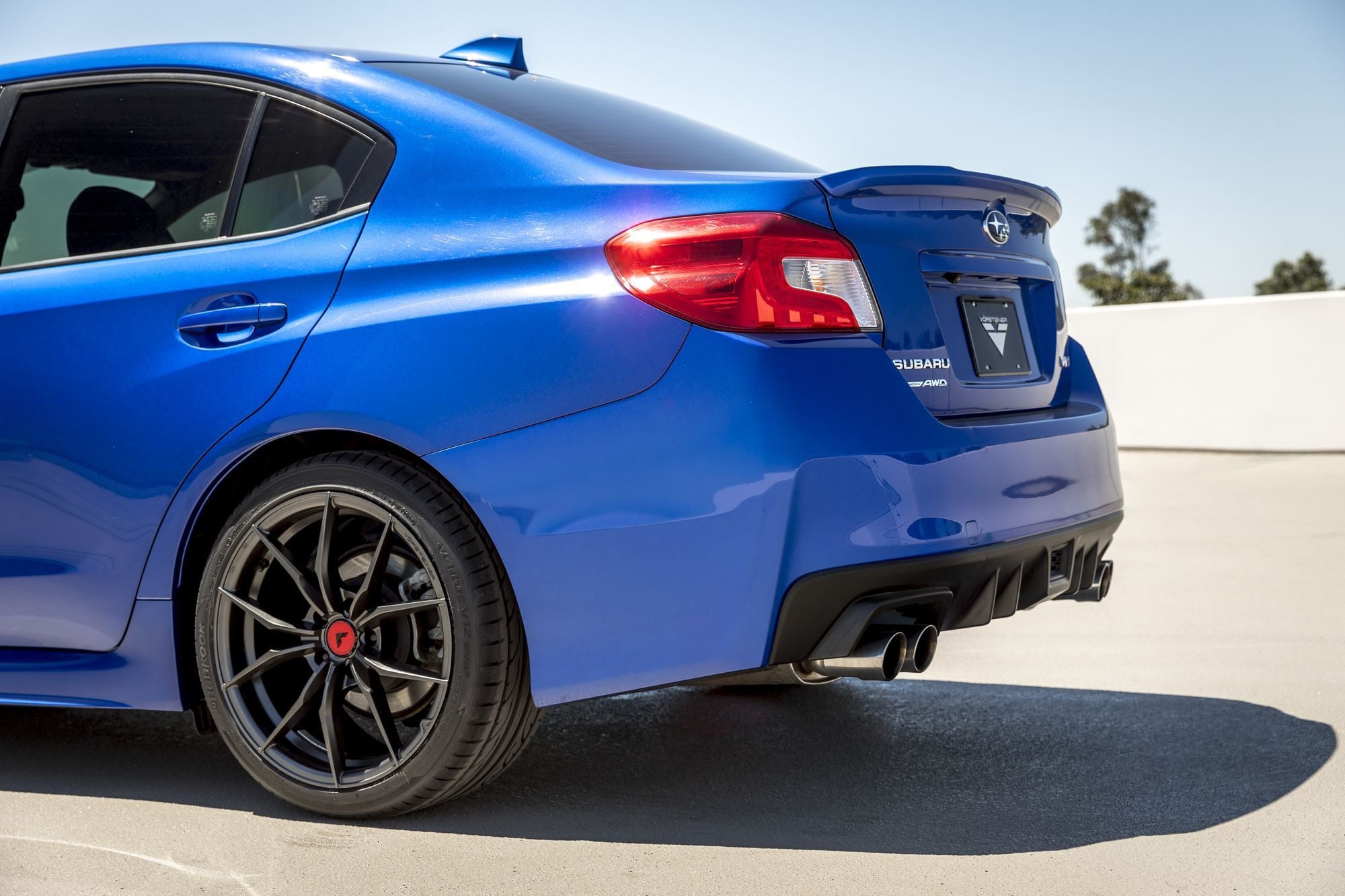Rear Lip Spoiler on Blue Subaru WRX - Photo by Vorstiner