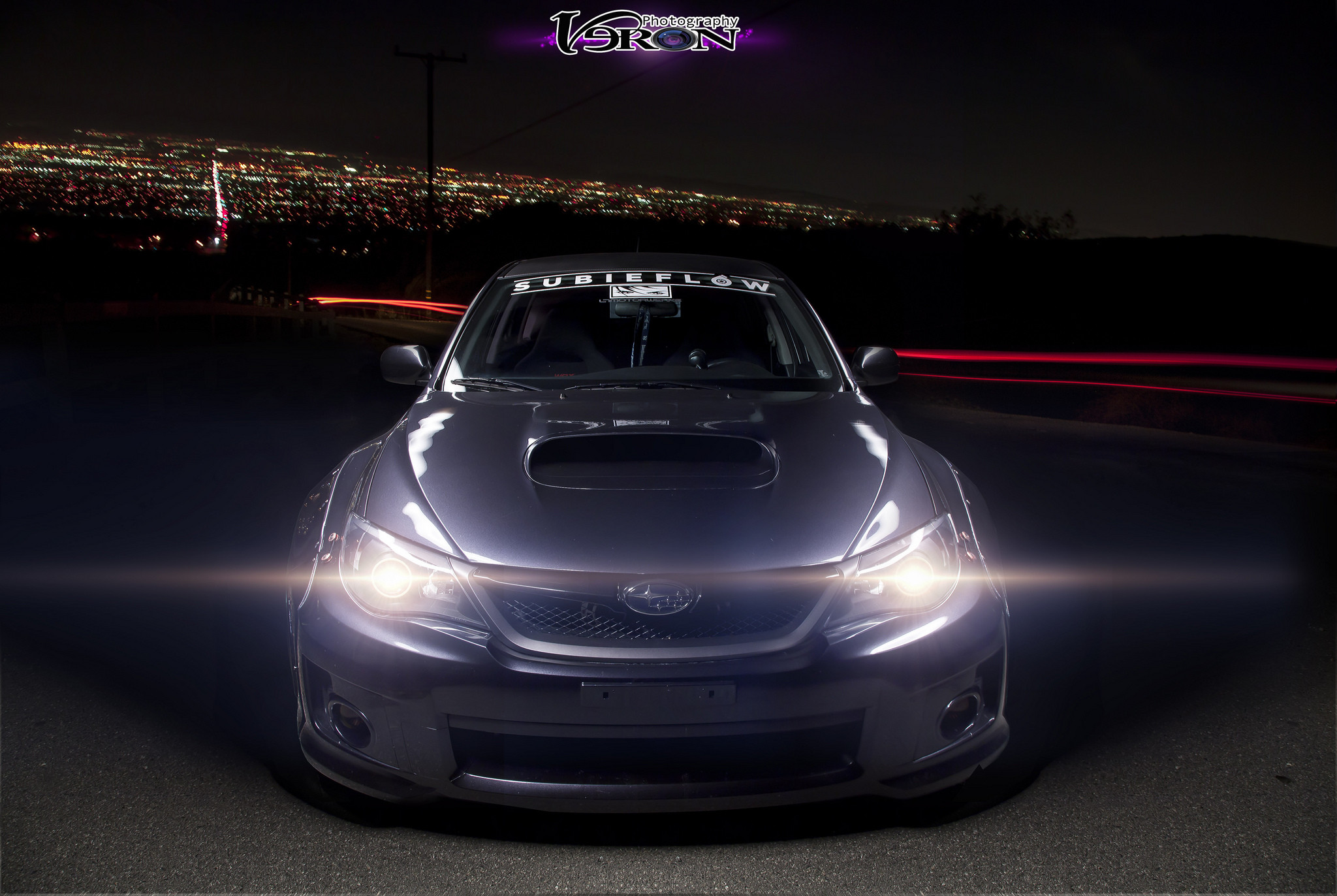 Aftermarket Projector Headlights on Black Subaru WRX - Photo by Manuel Veron