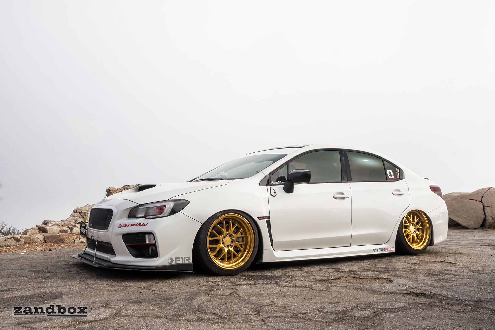Custom Headlights on White Subaru WRX - Photo by zandbox