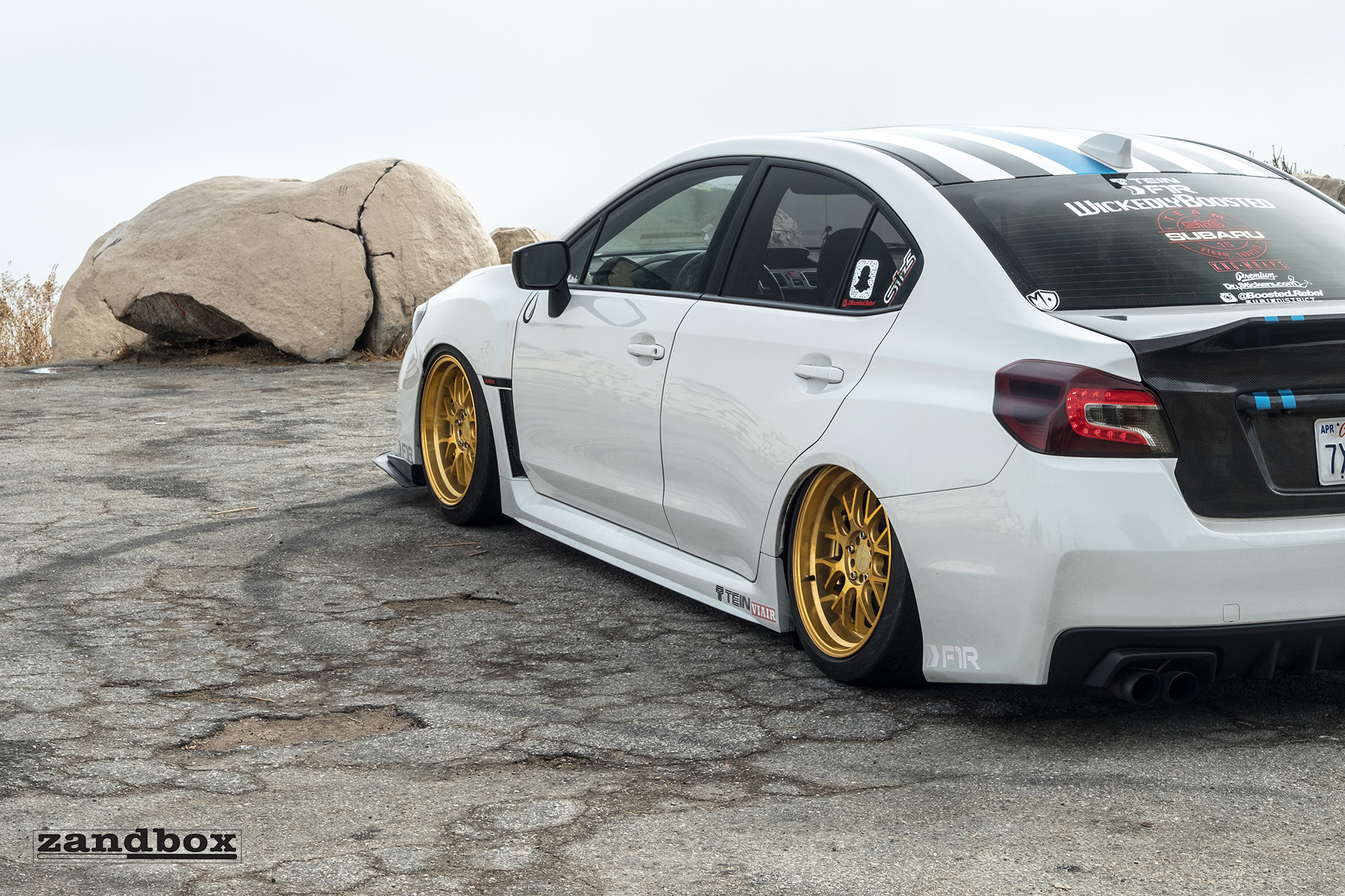 Aftermarket Side Skirts on White Stanced Subaru WRX - Photo by zandbox
