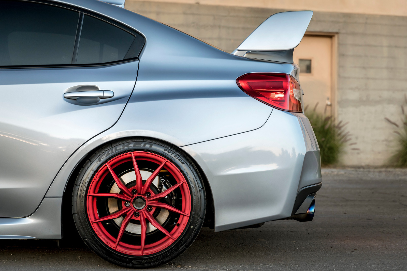 Gray Subaru WRX with Custom Red Vorsteiner Rims - Photo by Vorsteiner