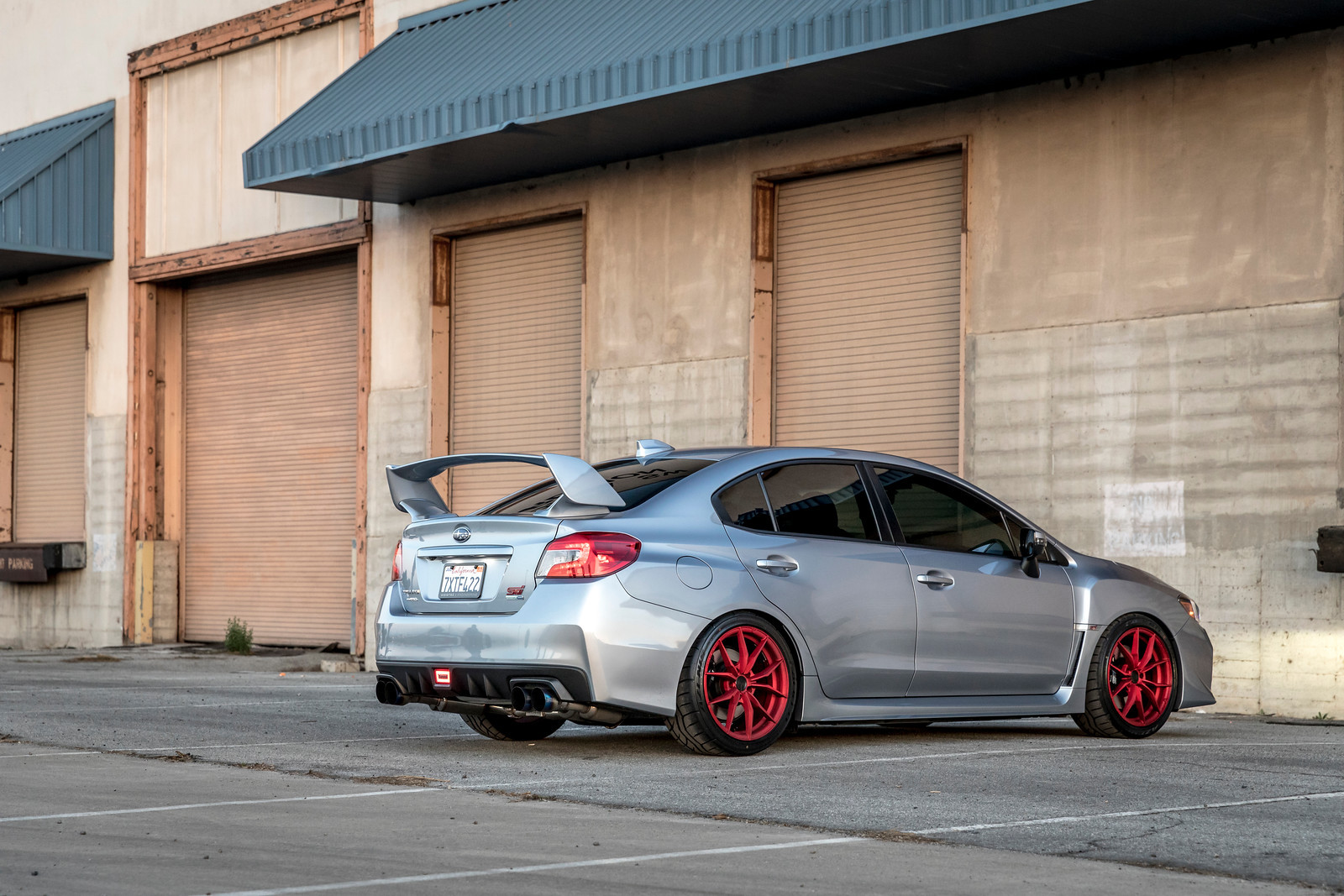 Custom Exhaust System on Gray Subaru WRX - Photo by Vorsteiner