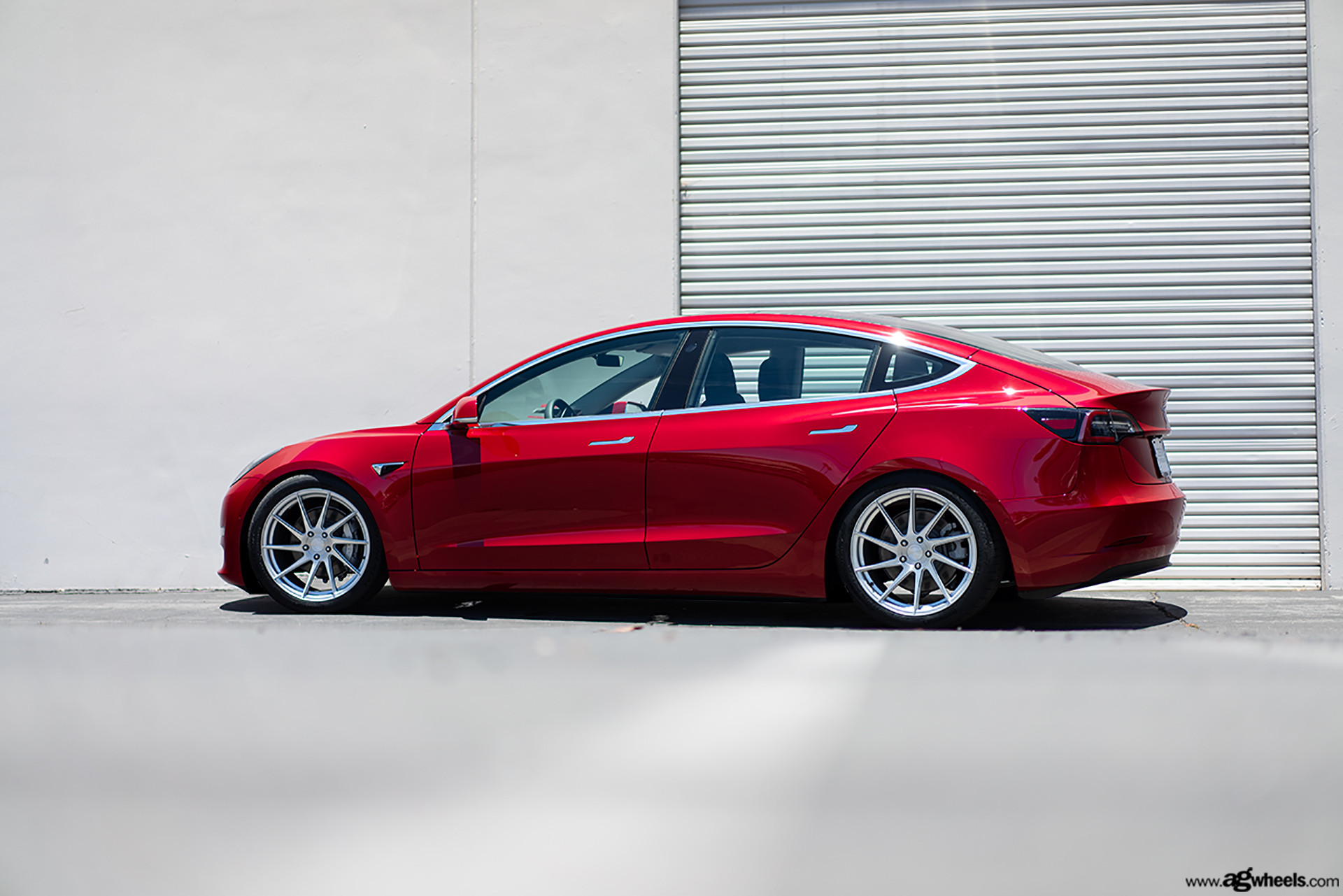 Aftermarket Side Skirts on Red Tesla Model 3 - Photo by Avant Garde Wheels