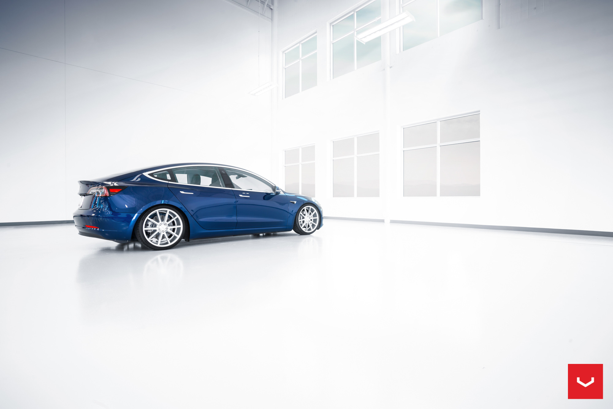 Custom Blue Tesla Model 3 Side Skirts - Photo by Vossen
