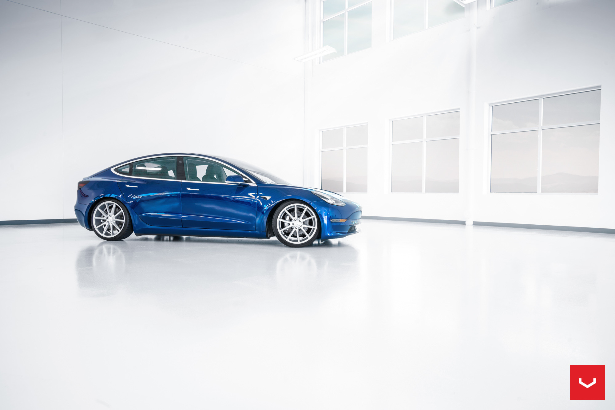 Chrome Vossen Wheels on Blue Tesla Model 3 - Photo by Vossen
