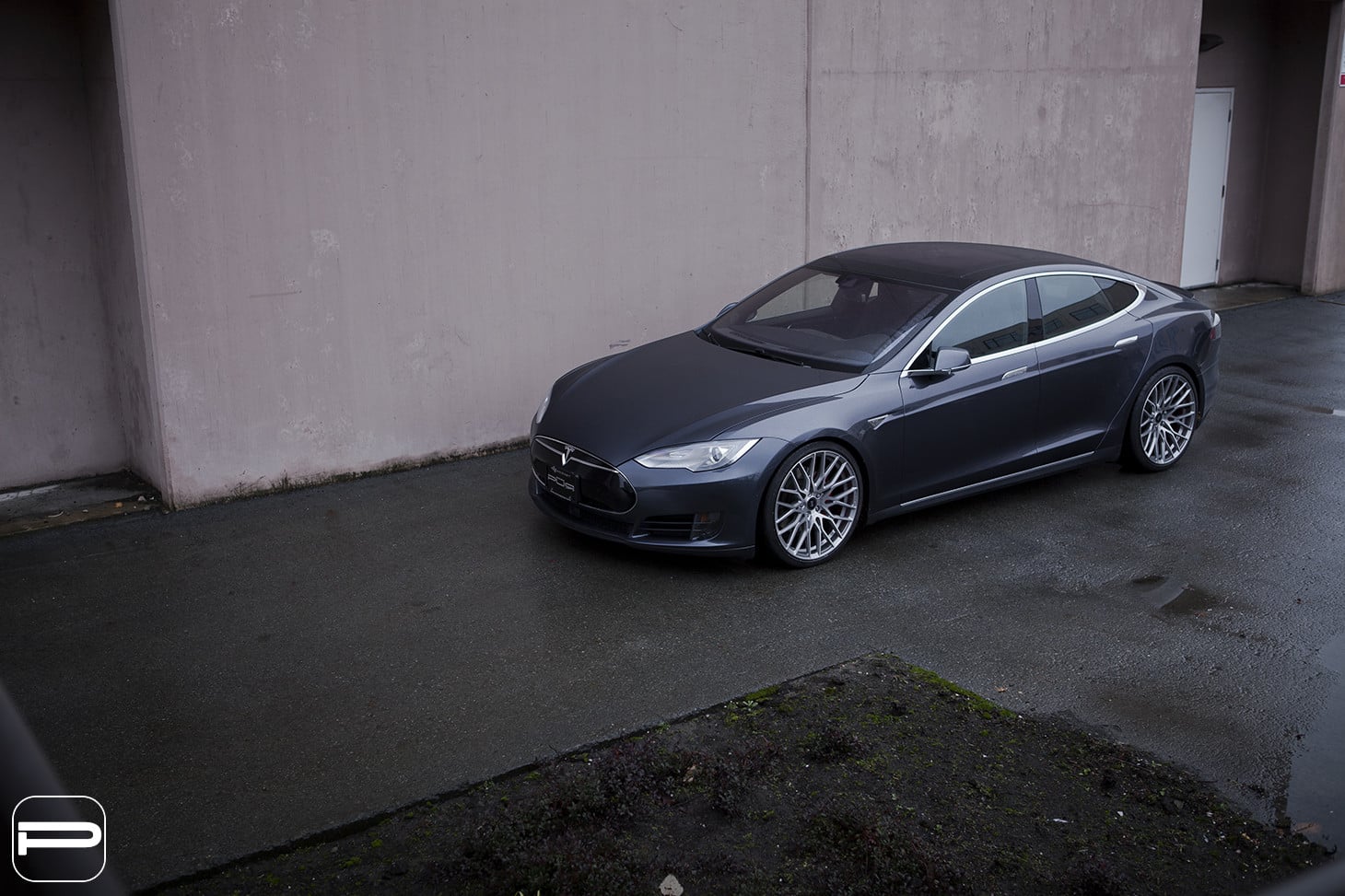 Custom Chrome Wheels on Black Tesla Model S - Photo by SR Auto Group