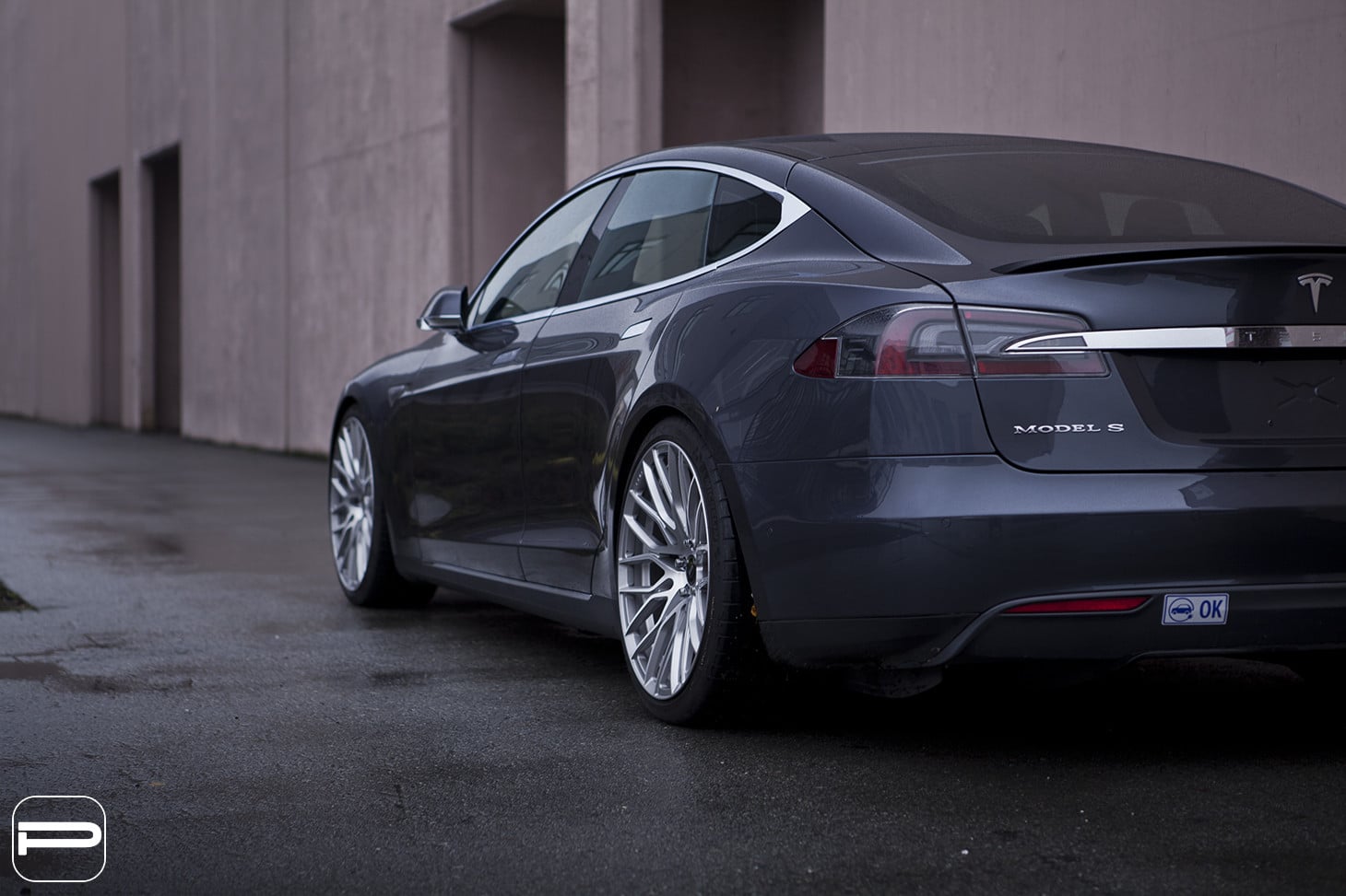 Black Tesla Model S with Red Smoke Taillights - Photo by SR Auto Group