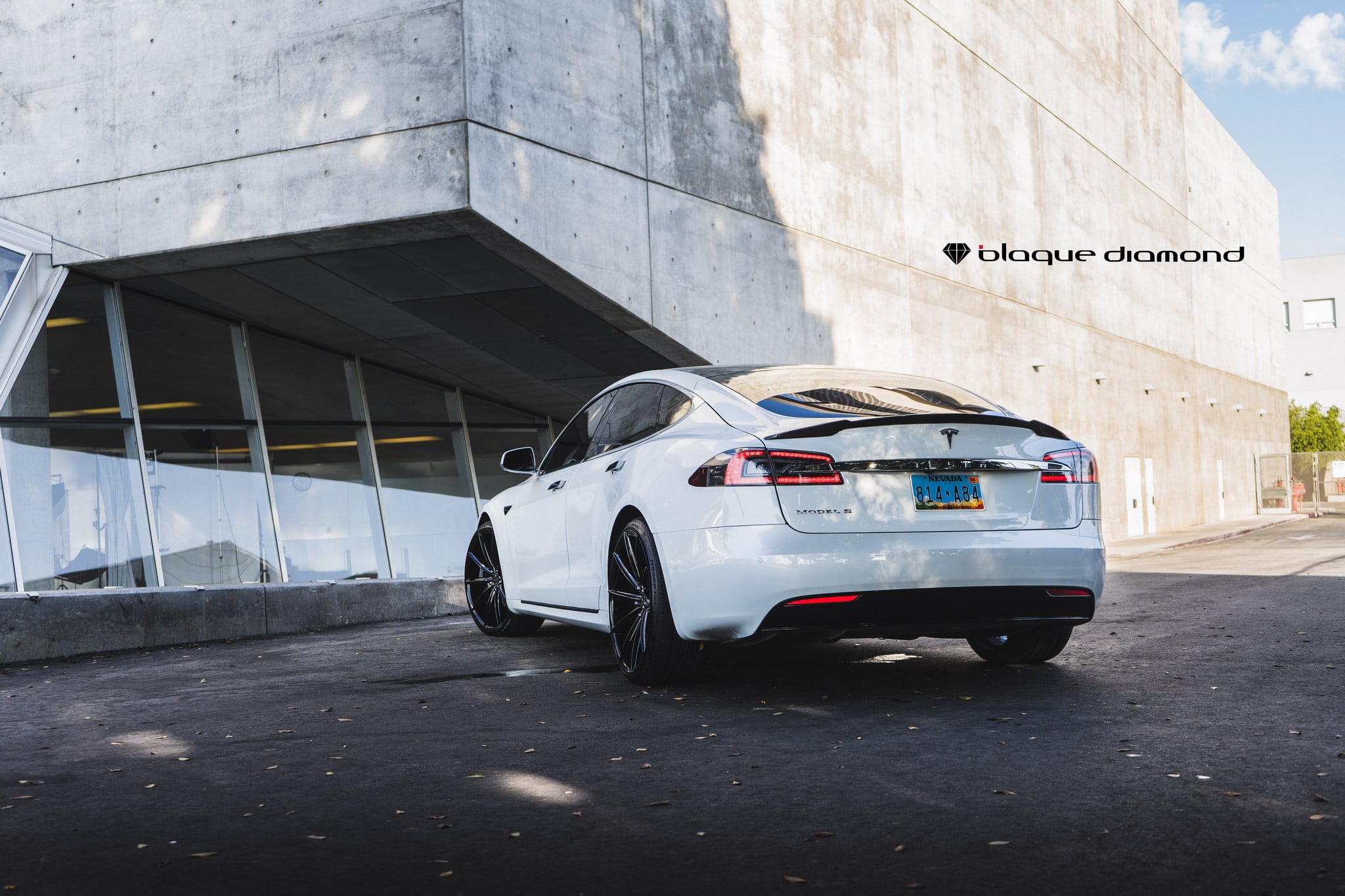 Rear Lip Spoiler on White Tesla Model S - Photo by Blaque Diamond