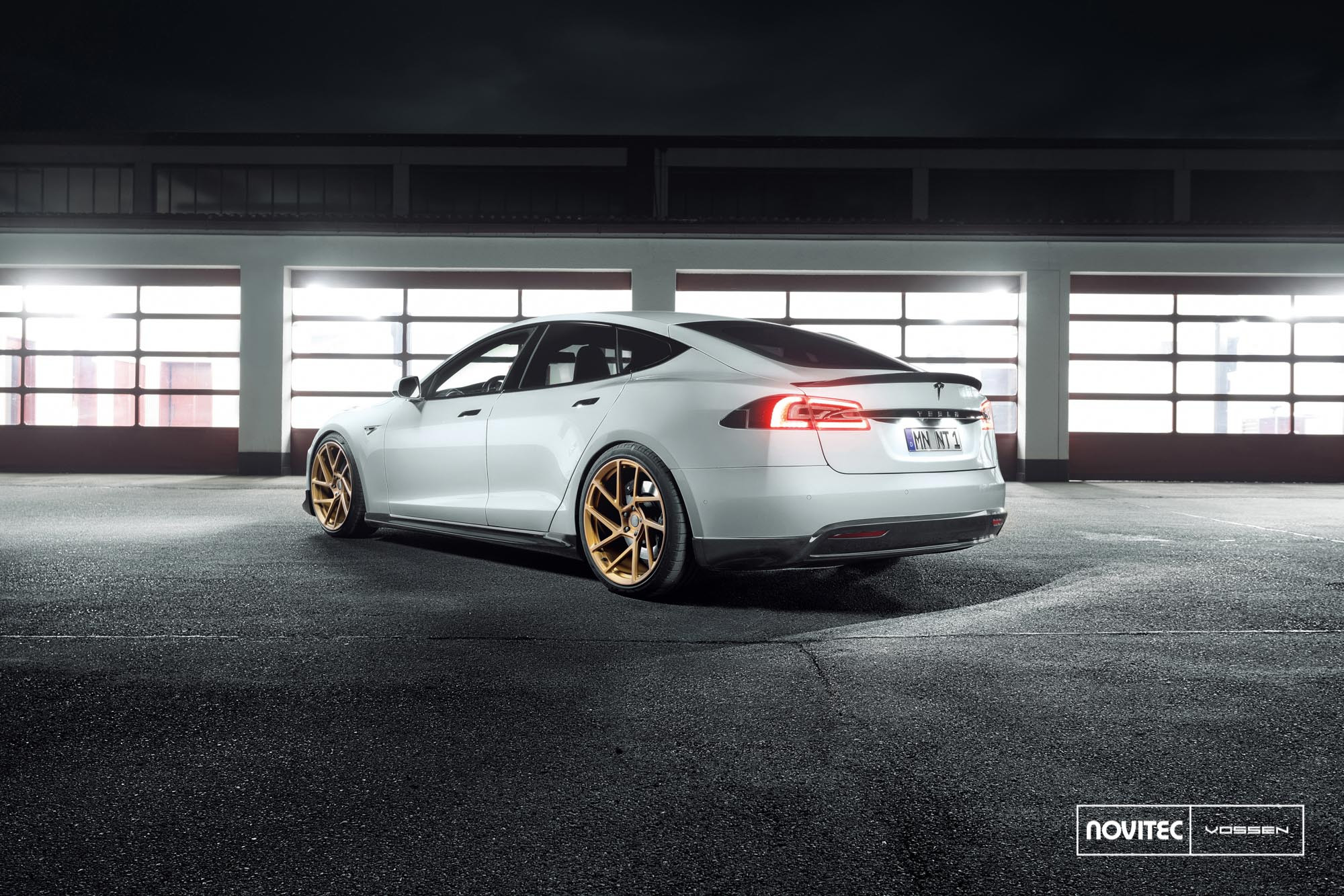 Aftermarket Rear Diffuser on White Tesla Model S - Photo by Vossen
