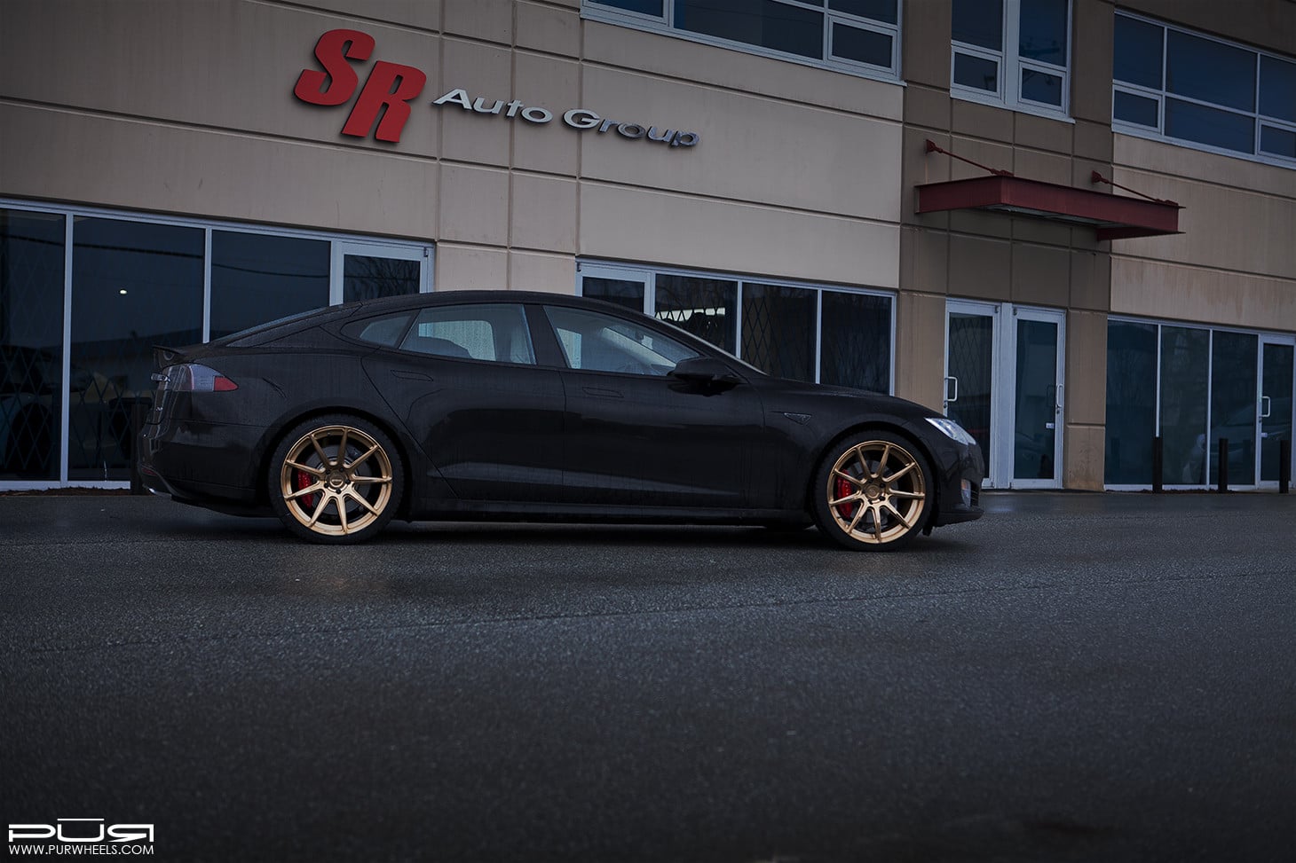 Aftermarket Side Skirts on Black Tesla Model S - Photo by PUR Wheels