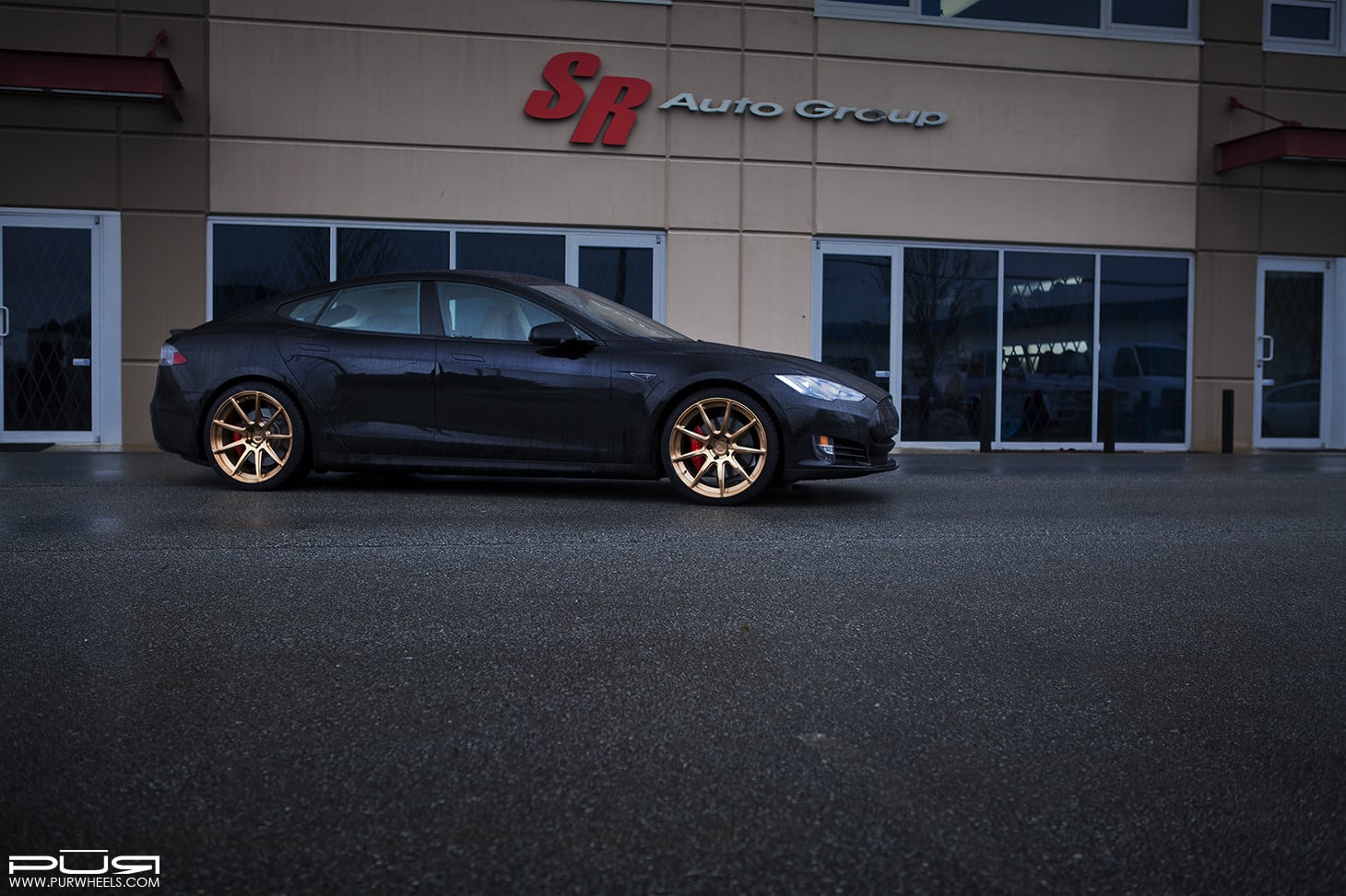 Gold PUR Wheels on Custom Black Tesla Model S - Photo by PUR Wheels