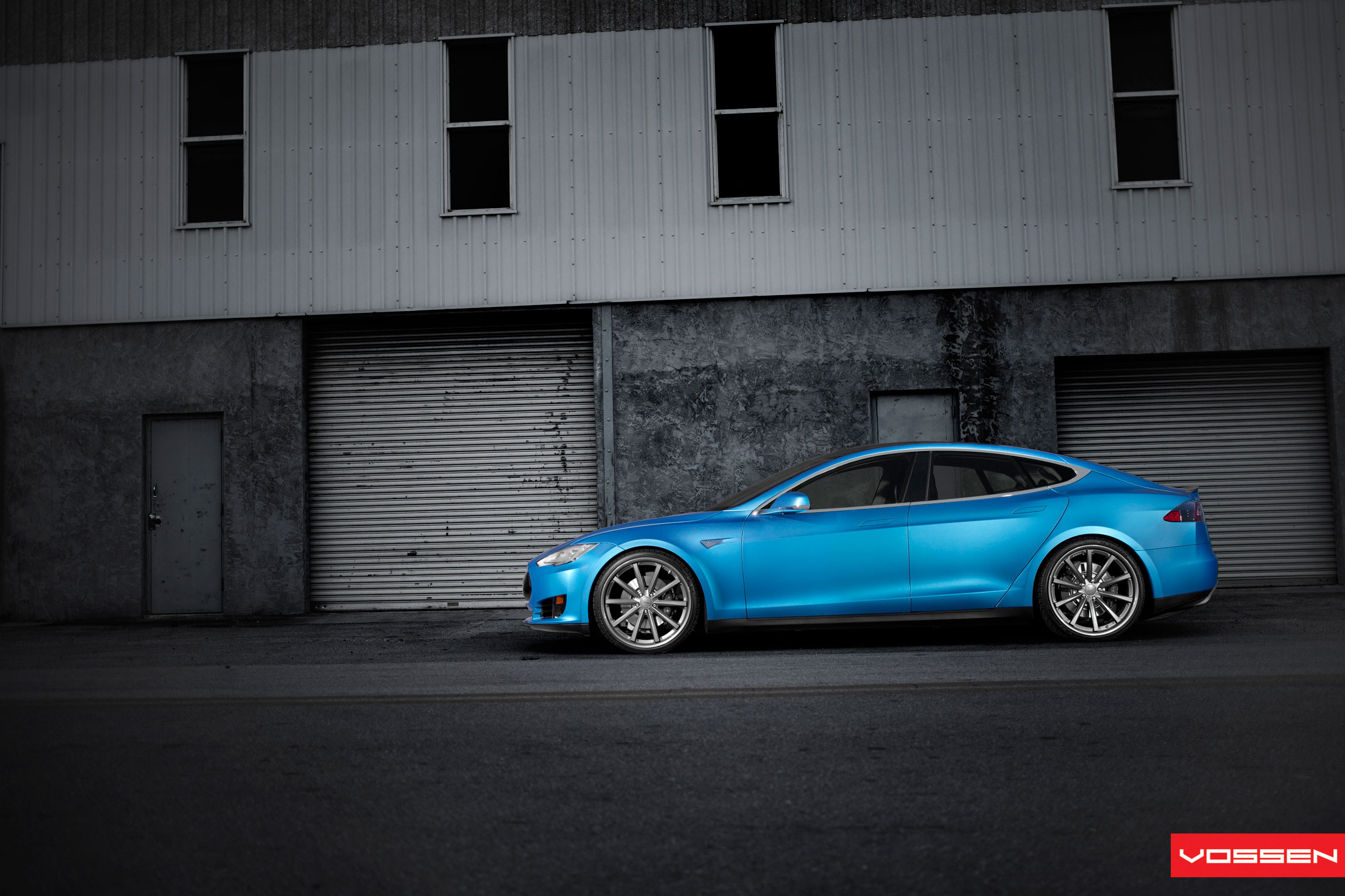Aftermarket Black Side Skirts on Blue Tesla Model S - Photo by Vossen