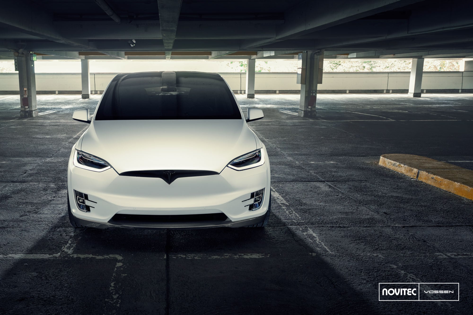 Carbon Fiber Front Lip on White Tesla Model X - Photo by Vossen