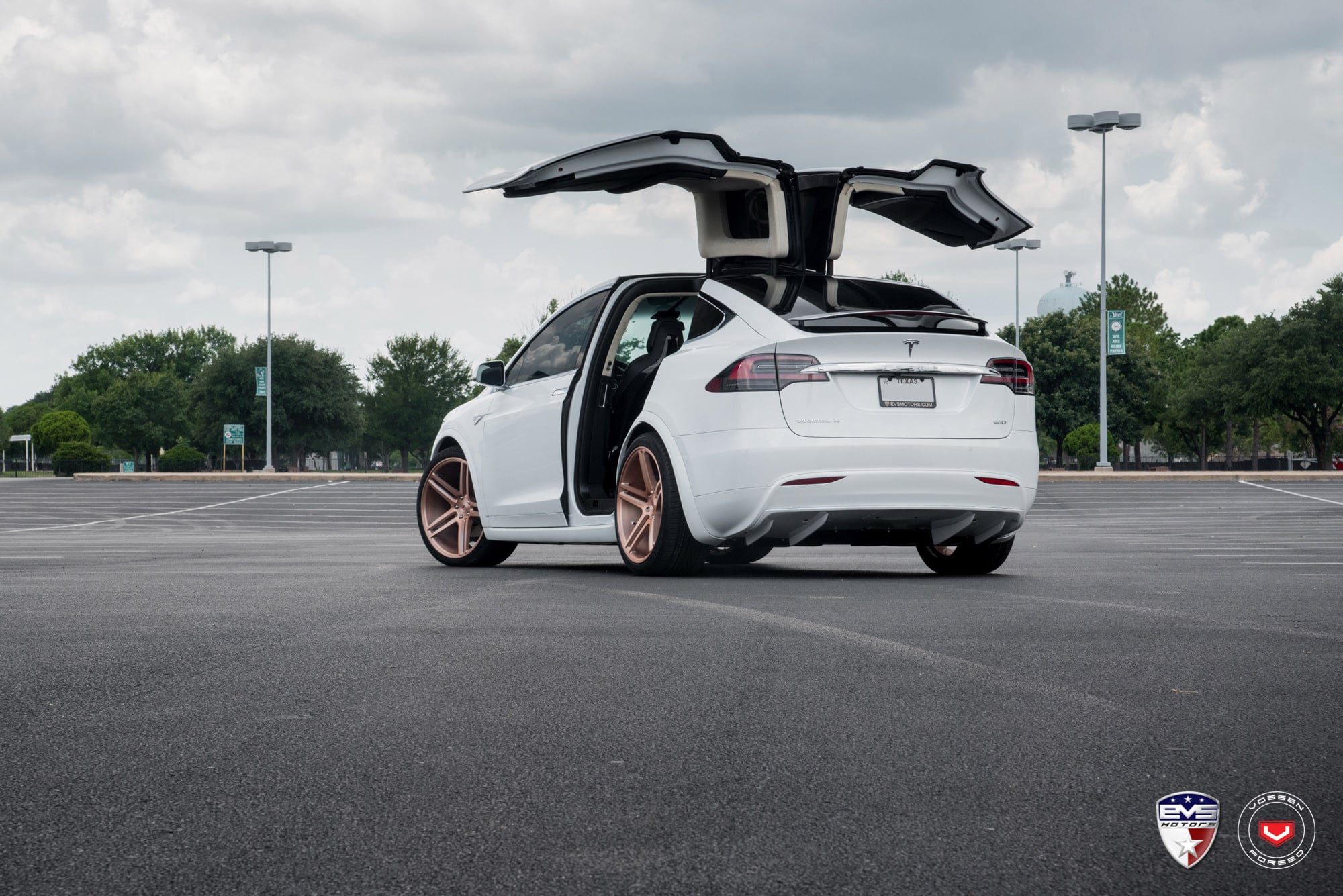 Vertical Doors on White Tesla Model X - Photo by Vossen