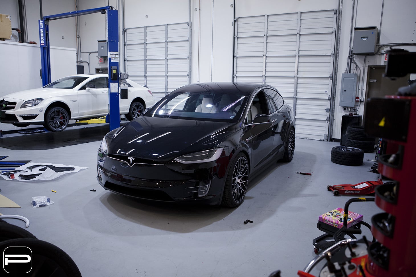 Dark Smoke Headlights on Black Tesla Model X - Photo by PUR Wheels