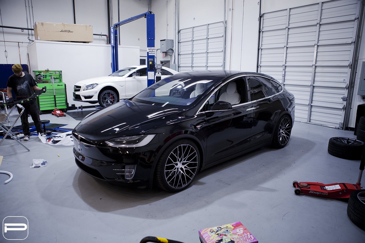 Custom Front Bumper on Black Tesla Model X - Photo by PUR Wheels