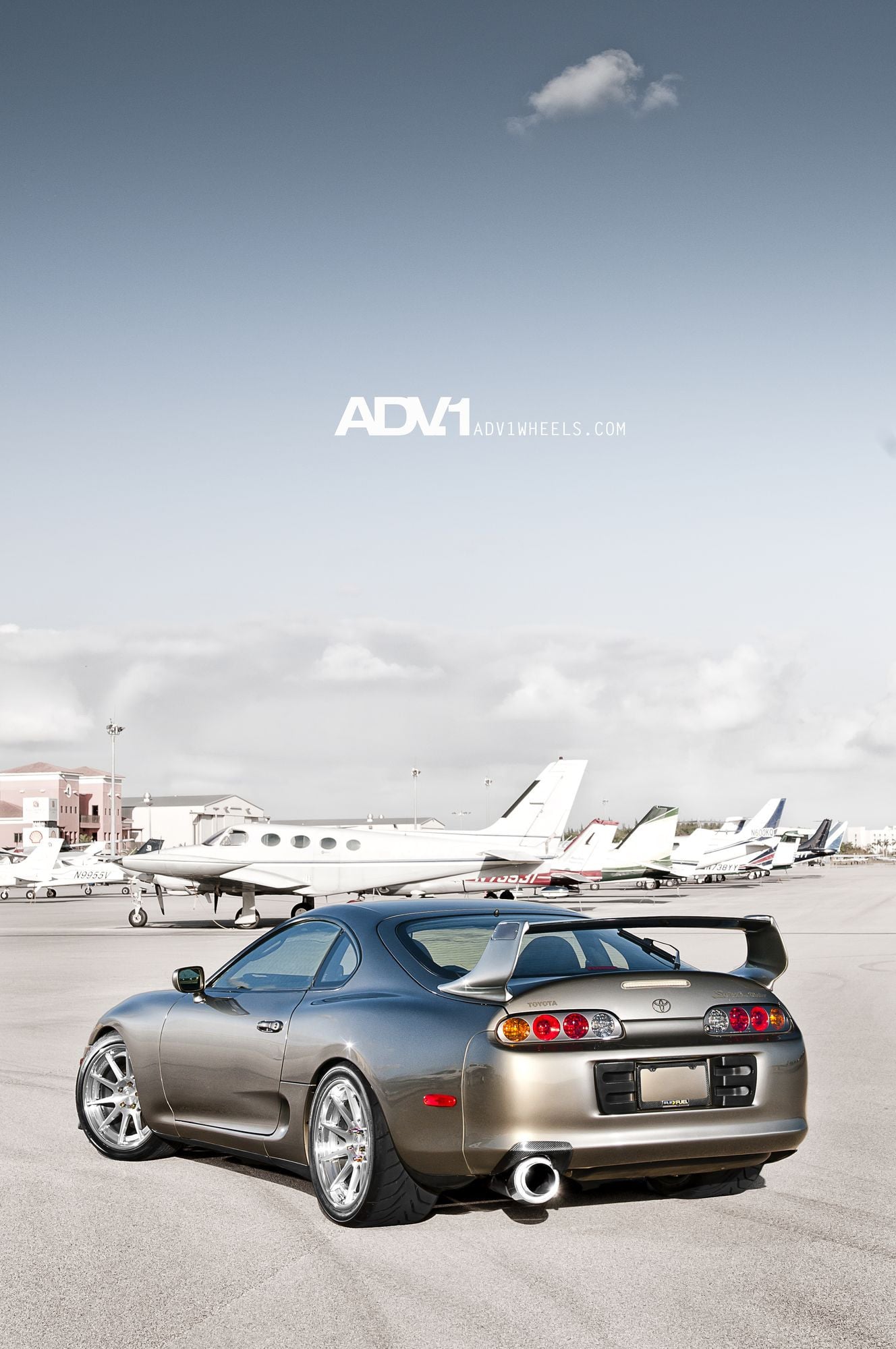 Gray Toyota Supra with Custom Exhaust System - Photo by ADV.1
