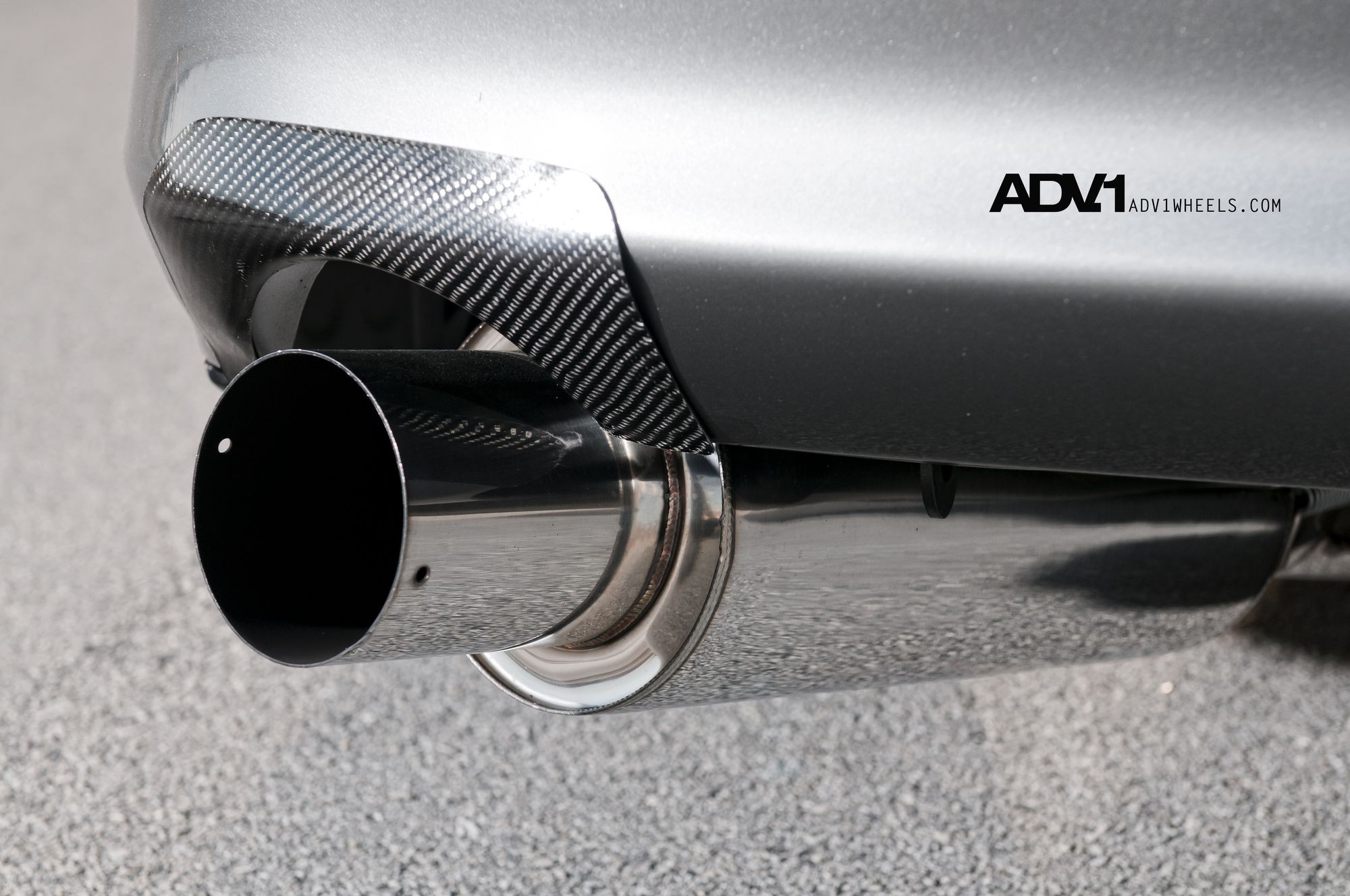 Carbon Fiber Cover on Gray Toyota Supra - Photo by ADV.1