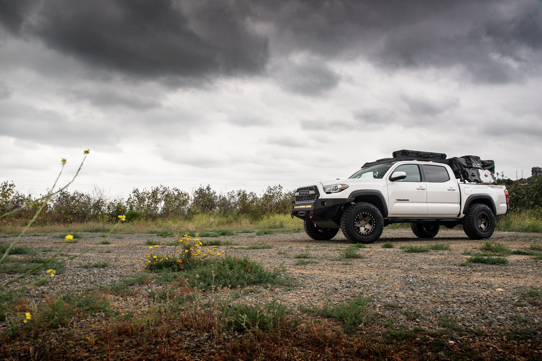 White Toyota Tacoma with Aftermarket Headlights - Photo by Black Rhino Wheels