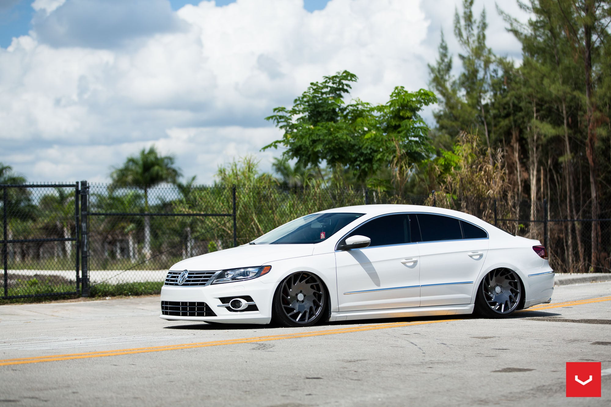 Aftermarket Side Skirts on White Volkswagen CC - Photo by Vossen