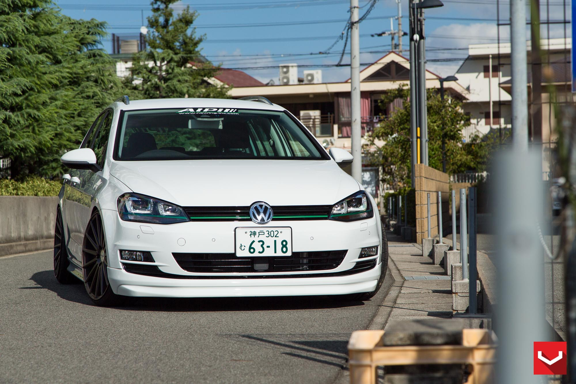White VW Golf with Aftermarket LED Headlights - Photo by Vossen