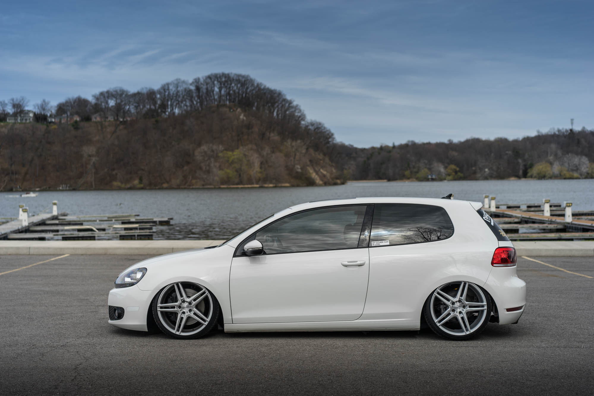 White VW Golf with Custom Niche Wheels - Photo by Niche