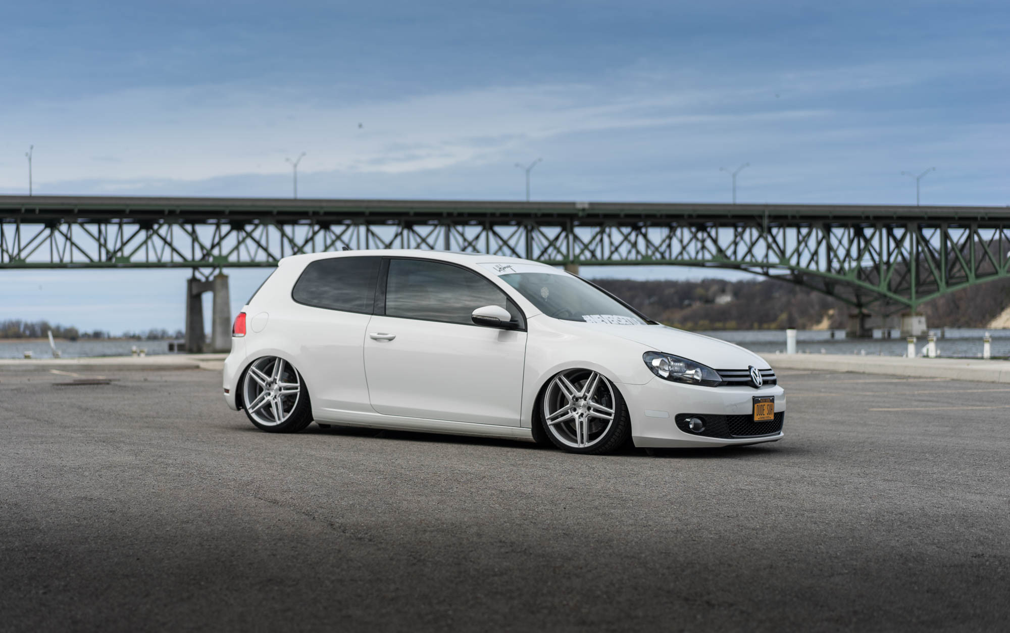 Brushed Silver Niche Rims on White VW Golf - Photo by Niche