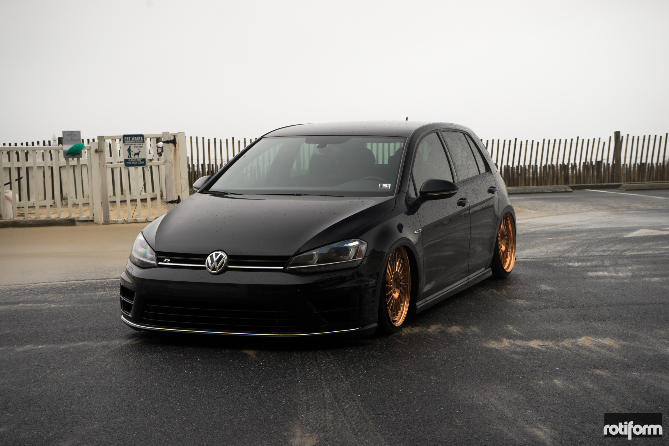 Black Stanced VW Golf with Dark Smoke Headlights - Photo by Rotiform
