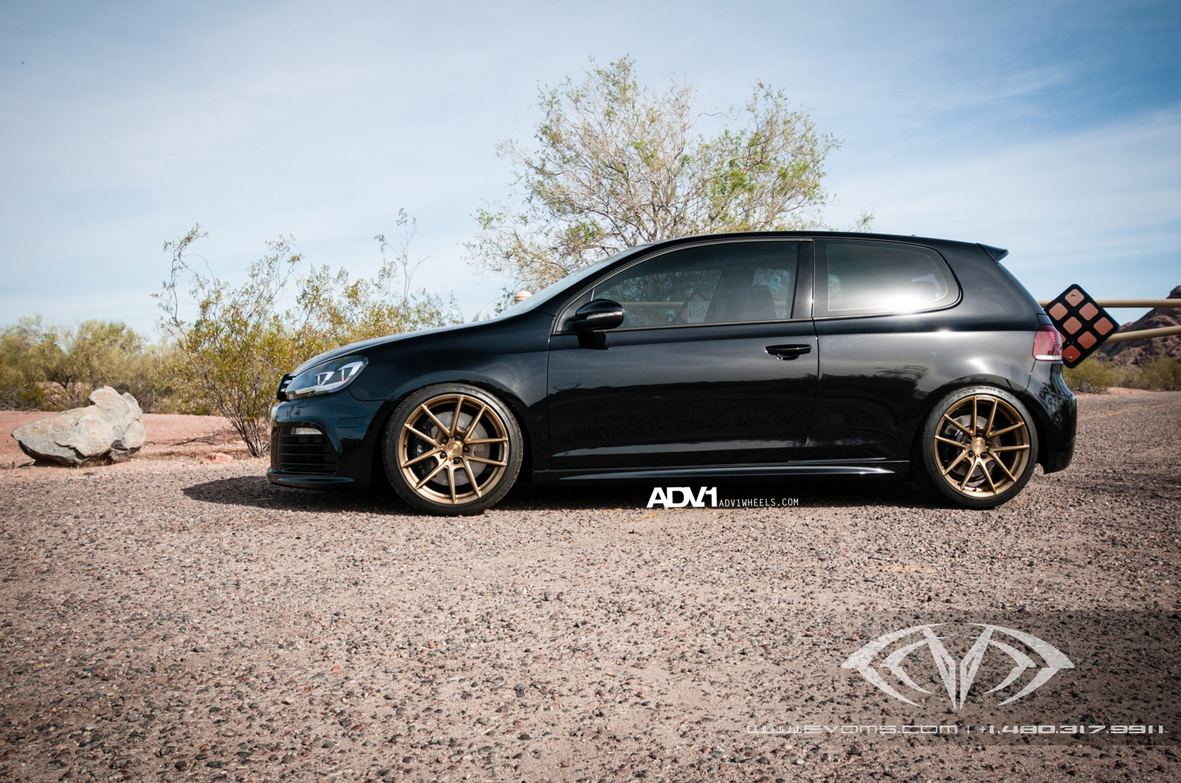 Black VW Golf with Aftermarket Side Skirts - Photo by ADV.1