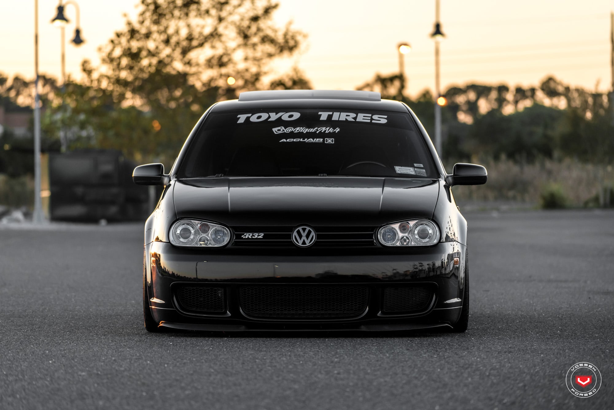 Aftermarket Front Lip on Black Stanced VW Golf - Photo by Vossen