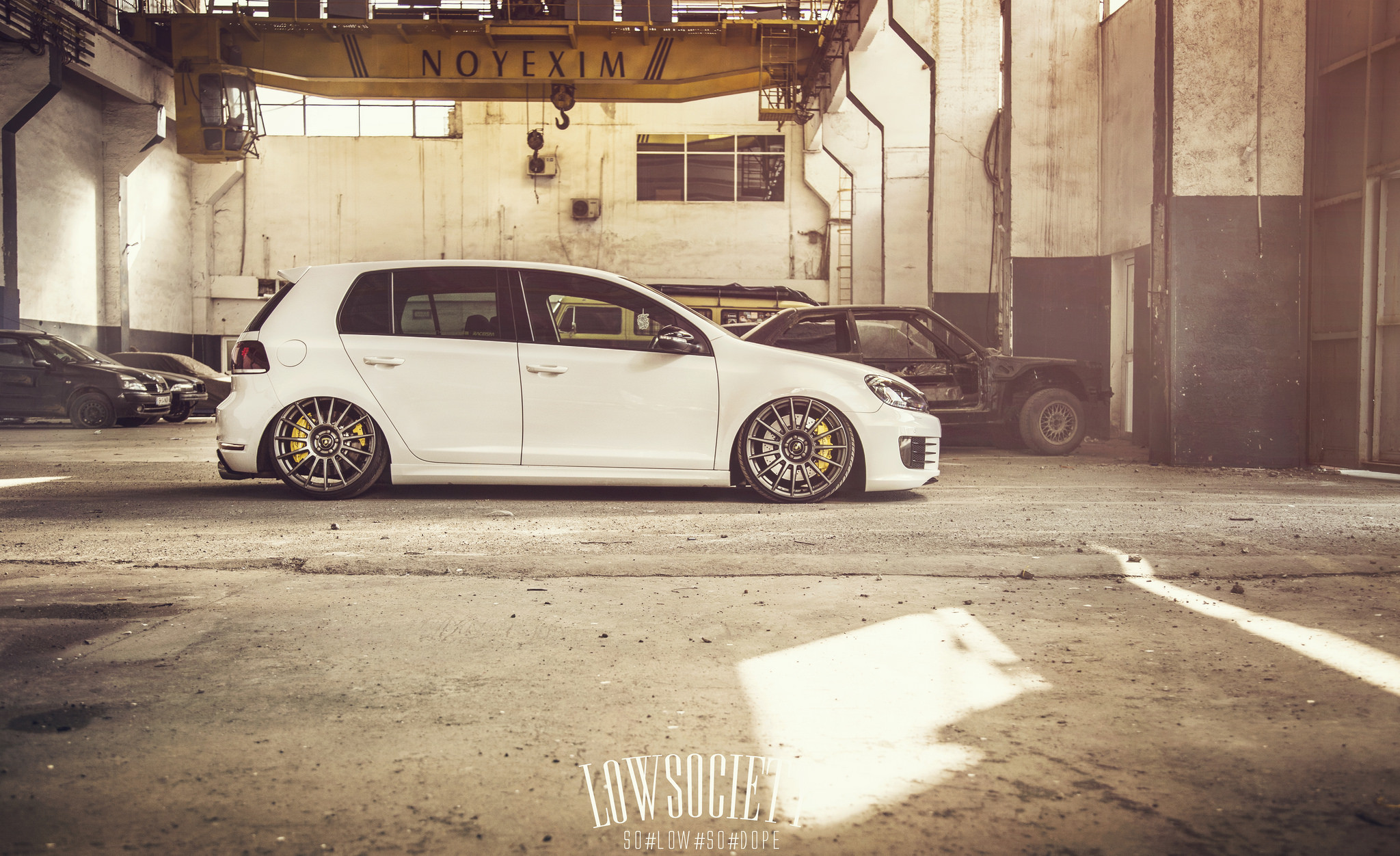 White Stanced VW Golf with Custom Side Skirts  - Photo by Ciprian Mihai