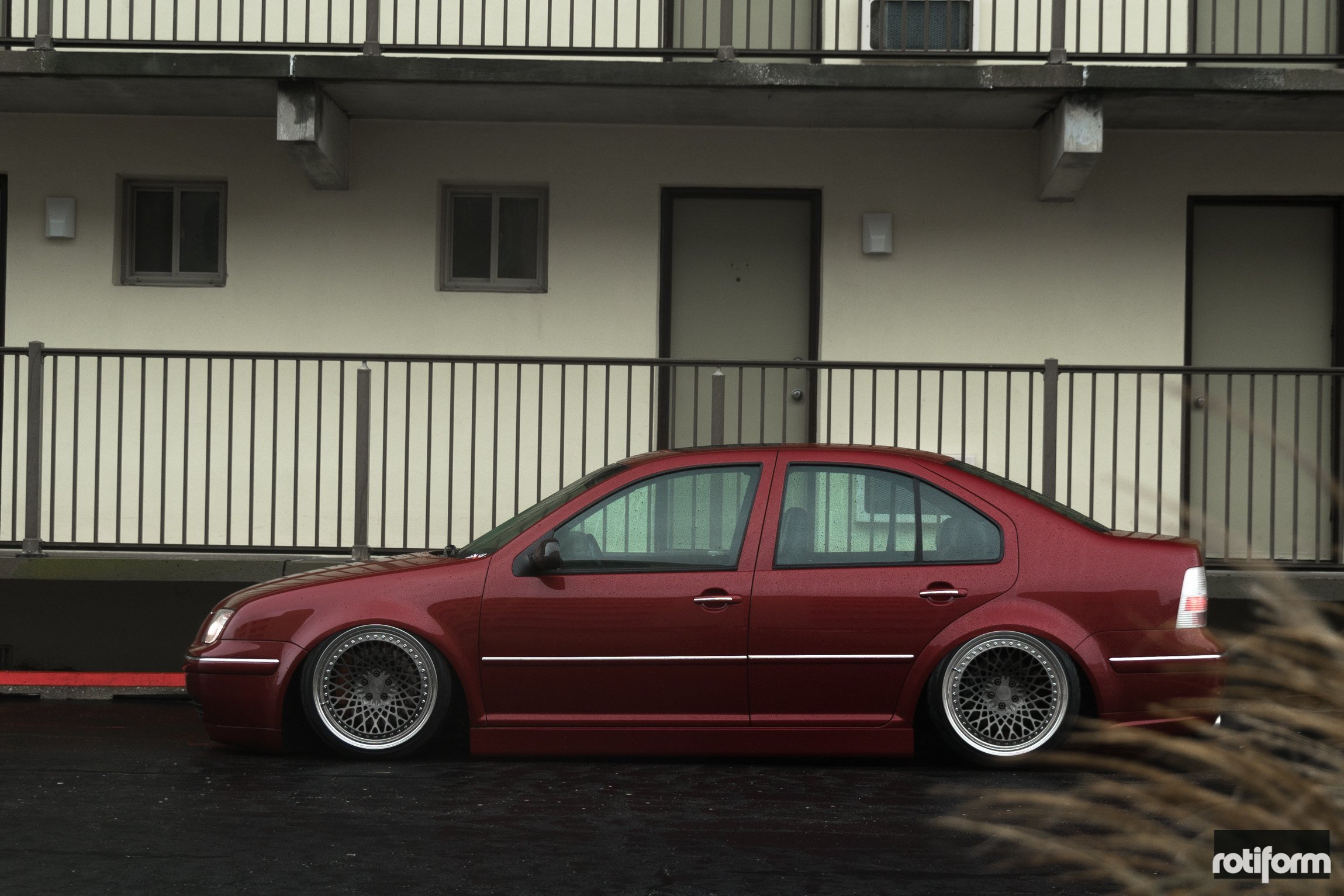 Slammed Jetta MK4 Sitting Low on Rotiform Custom Wheels.