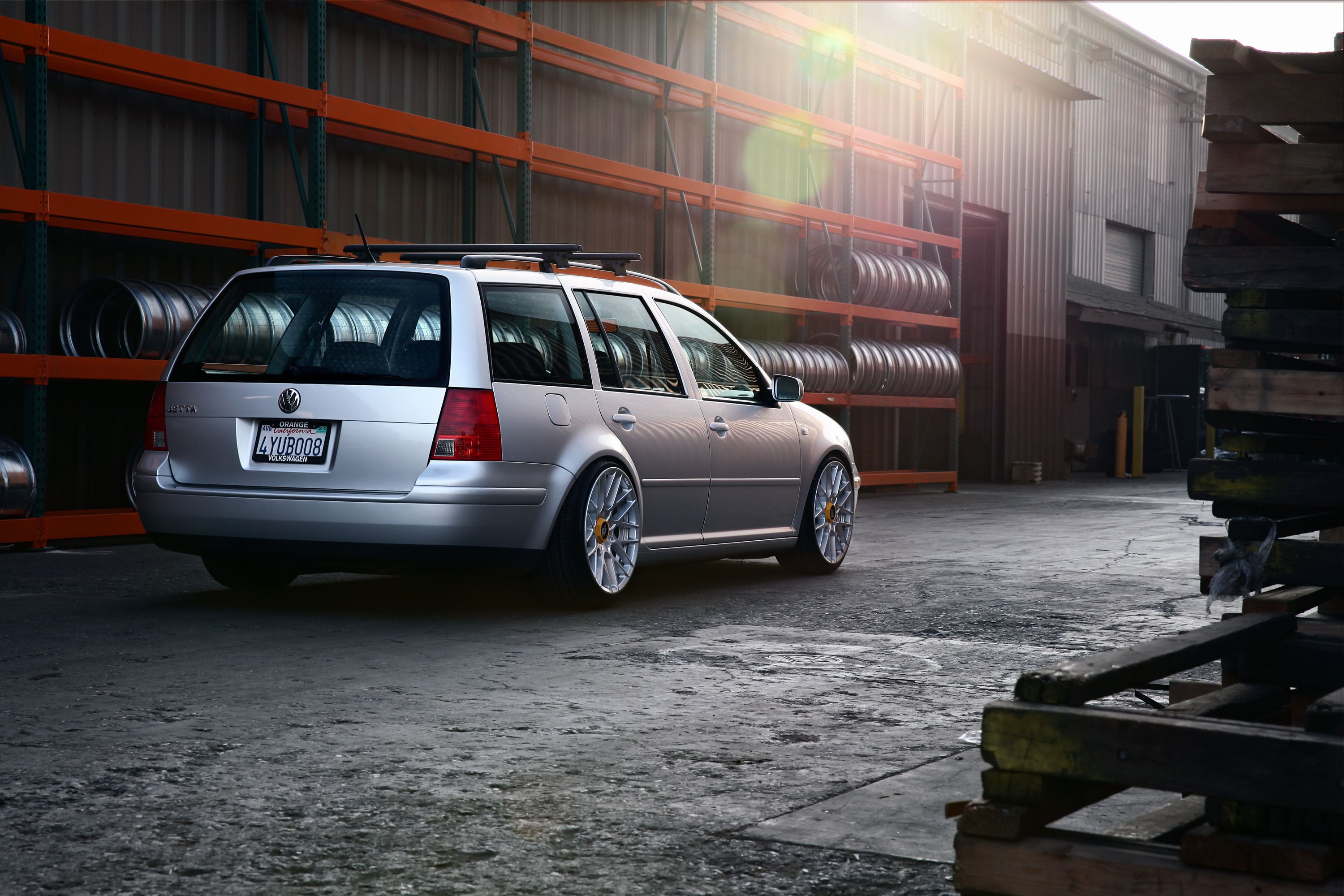Aftermarket Red Taillights on Silver VW Jetta - Photo by Rotiform