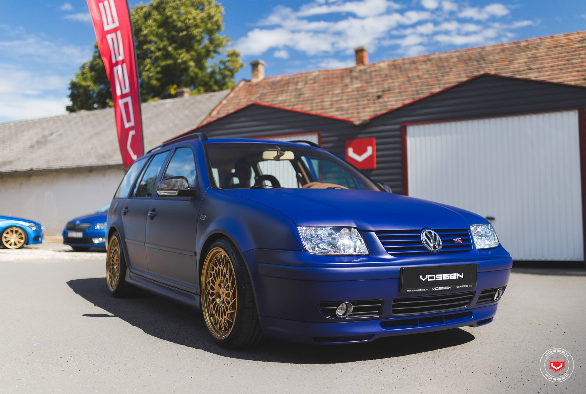Custom Front Bumper on Matte Blue VW Jetta - Photo by Vossen