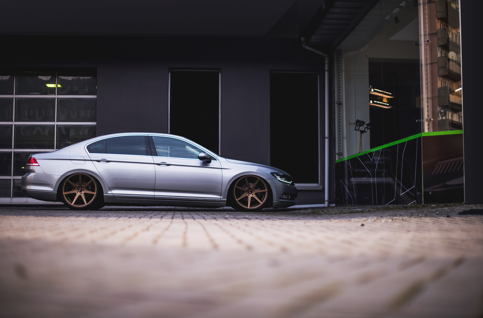 Bronze JR Wheels on Gray VW Passat - Photo by JR Wheels