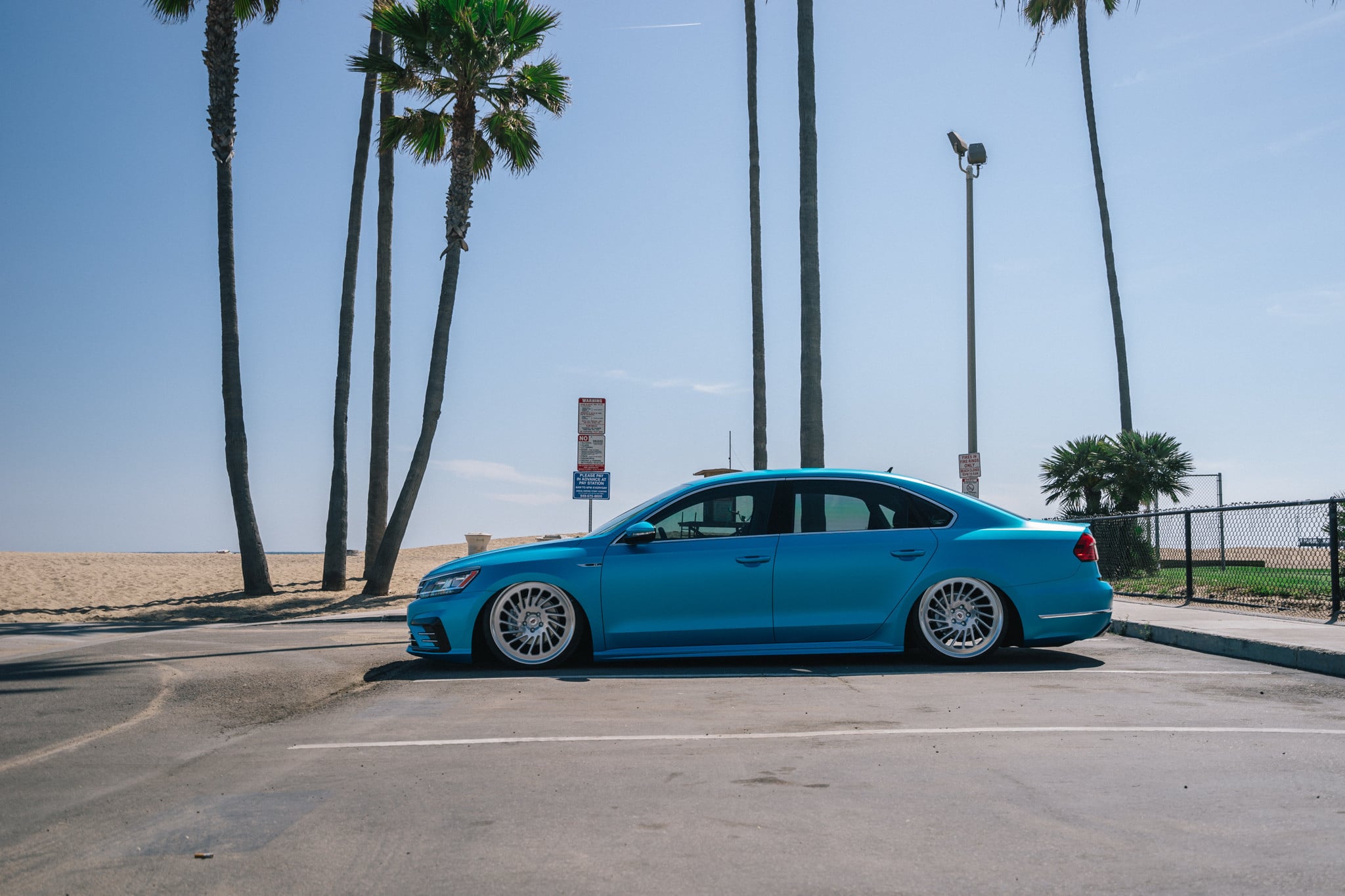 Blue VW Passat R with Custom Chrome Wheels - Photo by Boden Autohaus
