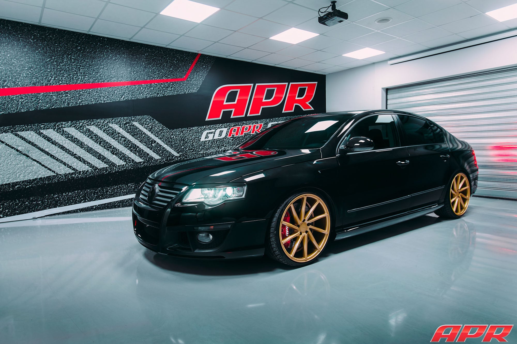 Black VW Passat with Crystal Clear Headlights - Photo by Vossen